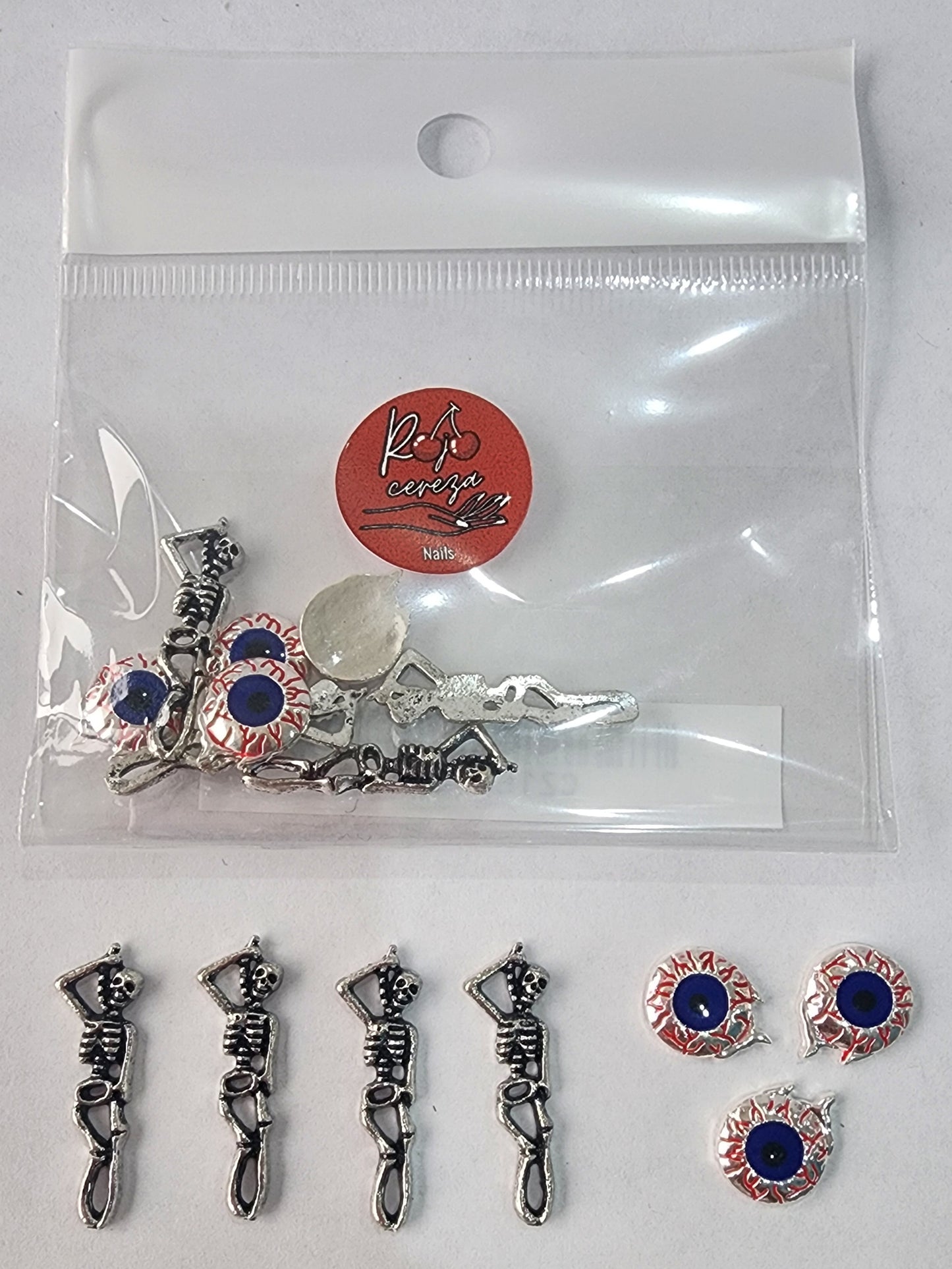 Set Dijes calaveras y ojos cont. 8 pz,Rojo Cereza 🍒